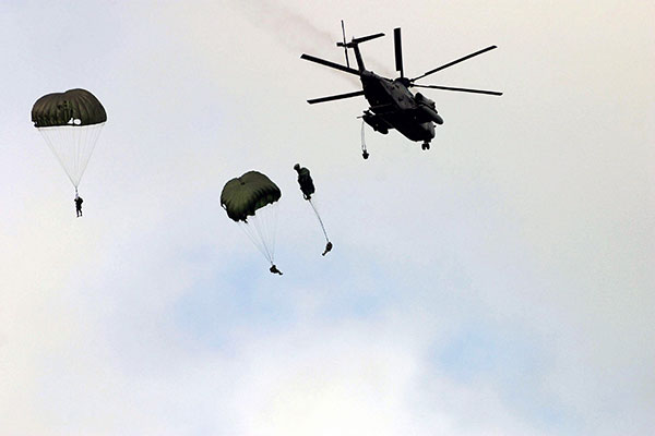 Force Recon Marines - parachuting from helicopter